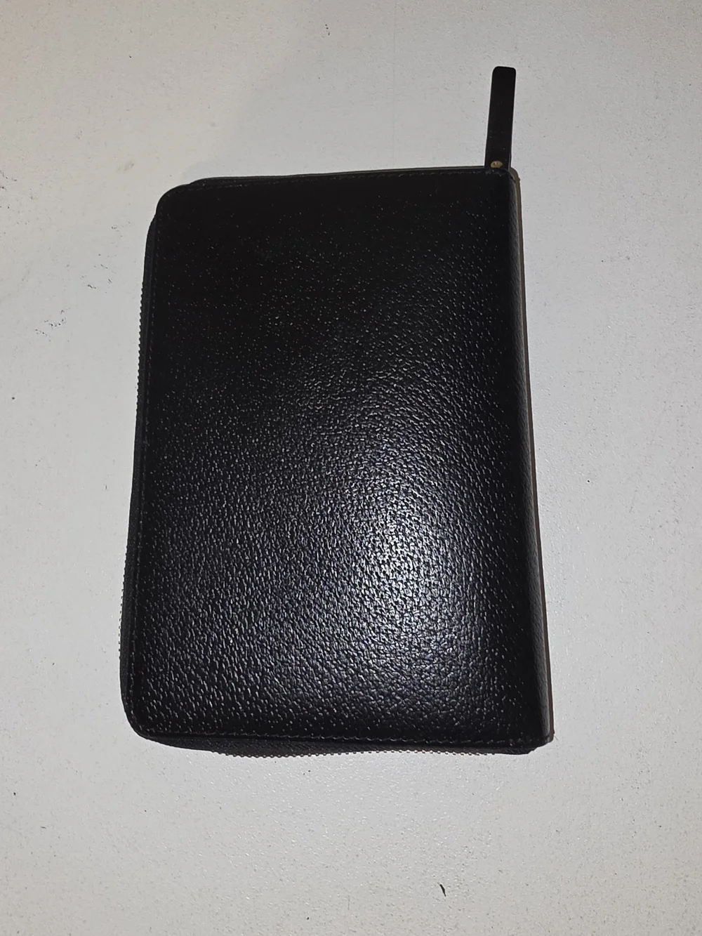 black pebbled leather Kate Spade Wellesley zip-around personal organizer